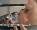 Student and microscope
